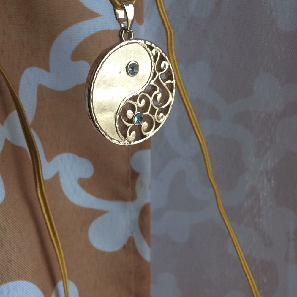 Ying yang piece and glass picture